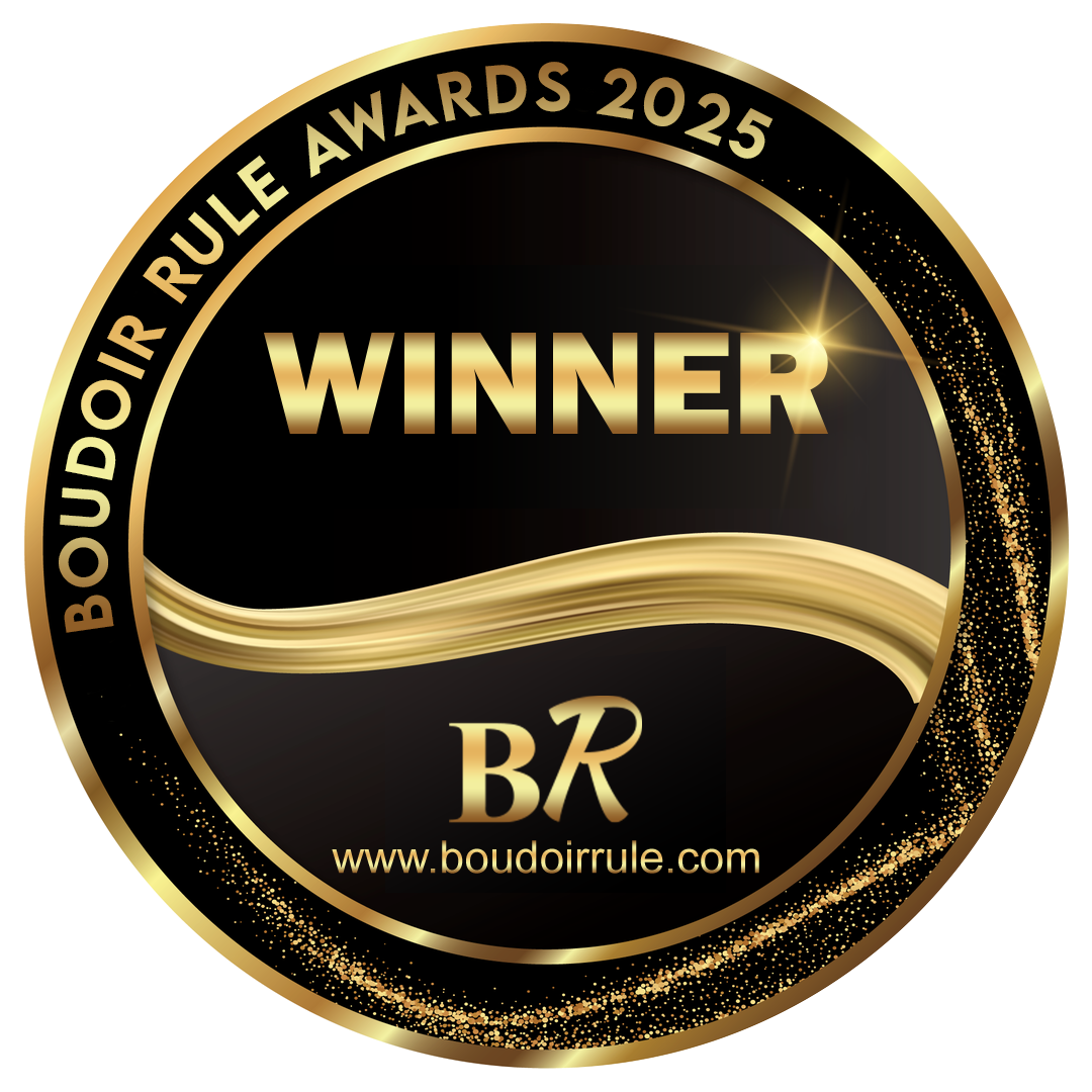 A gold and black circular badge reads "Boudoir Rule Awards 2025 Winner" with the BR logo and website www.boudoirrule.com.